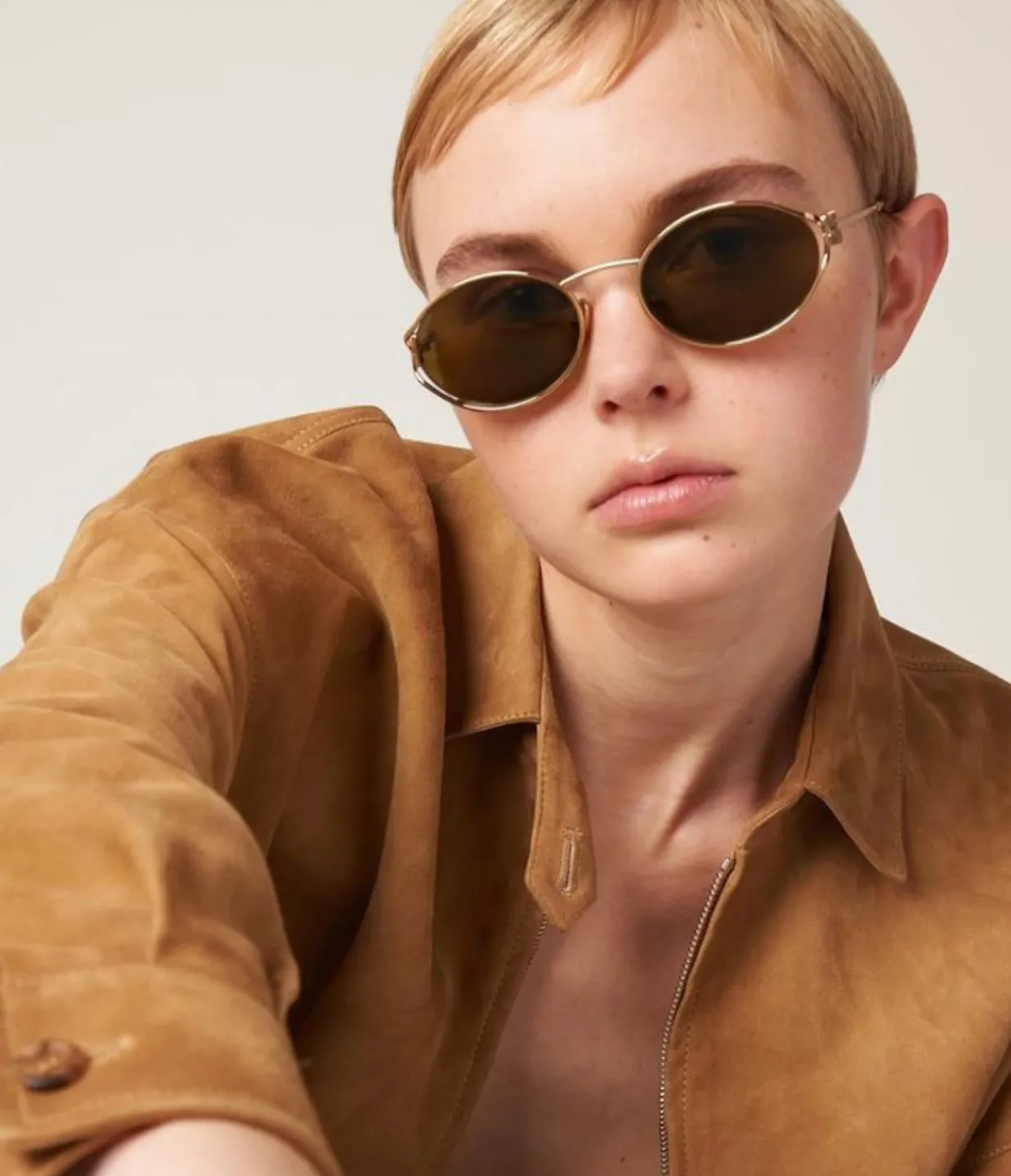 Miu Miu Oval Sunglasses in Brass Gold Cheap