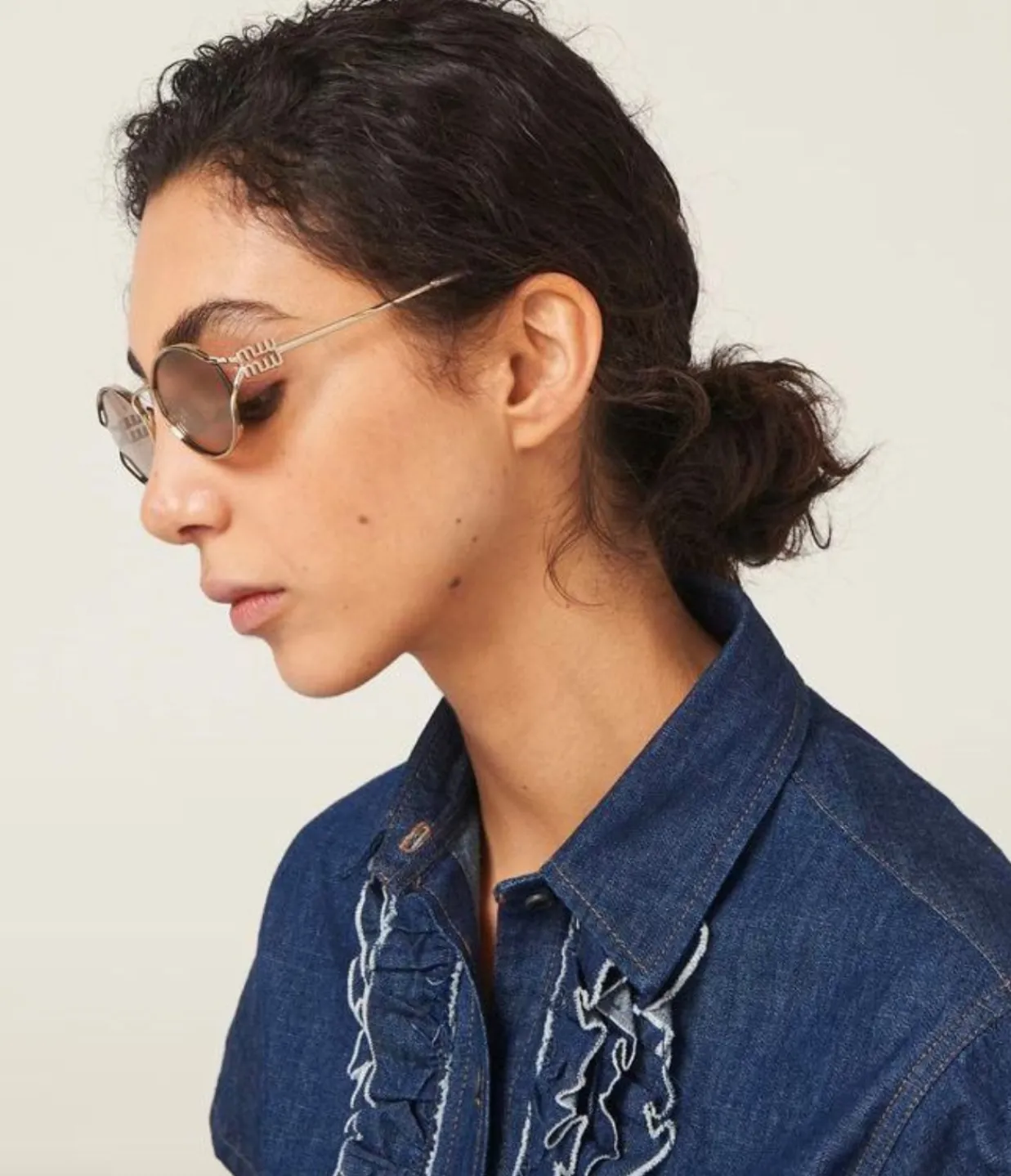 Miu Miu Oval Sunglasses in Pale Gold Online